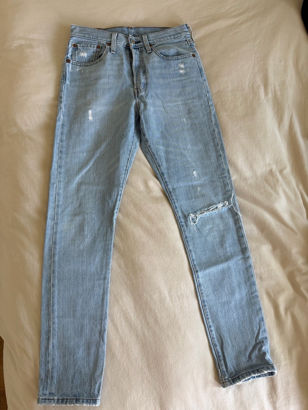 Levi's 501 Women's Light Blue Jeans with Distressed Knee